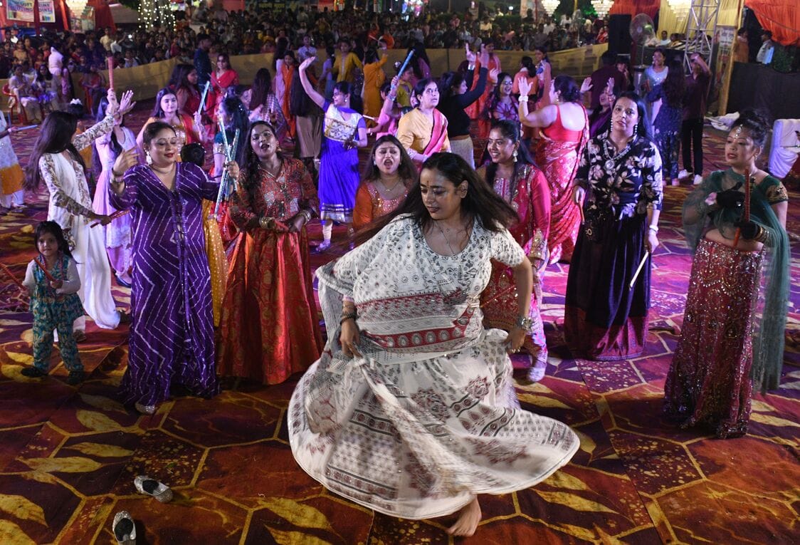The colors of Radha-Krishna in Ganpati's court