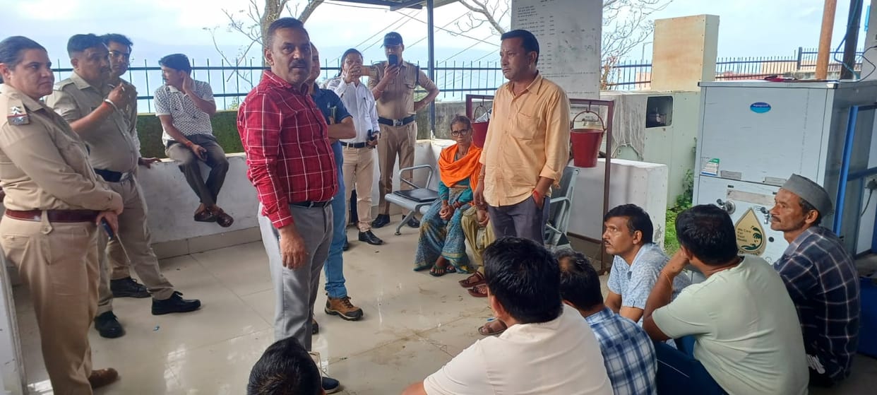 Outrage over lineman's death; villagers protest at power station with body for 11 hours.