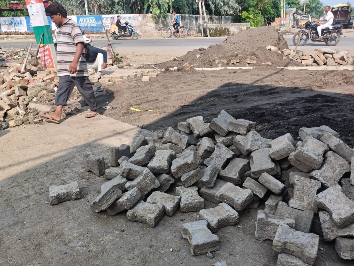 Villagers halted the construction work of a culvert being built along the highway