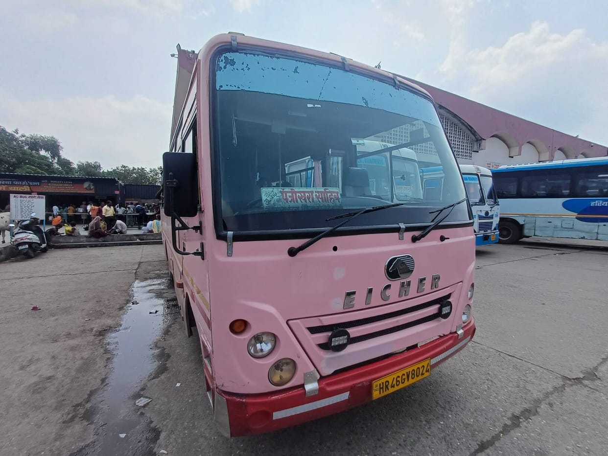 Designed for women, men are now also traveling in 'Pink Buses'.