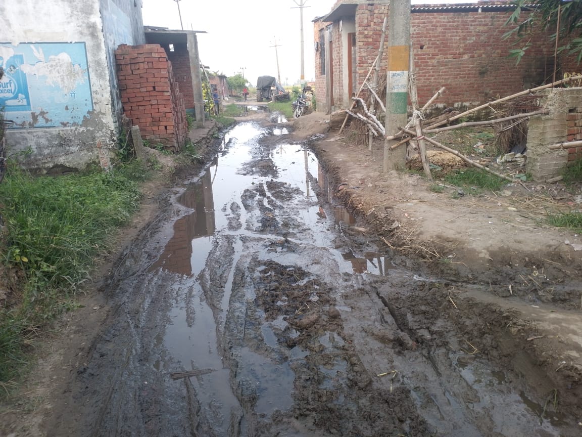 Waterlogging on roads in Indalpur due to damaged drains and paved pathways.