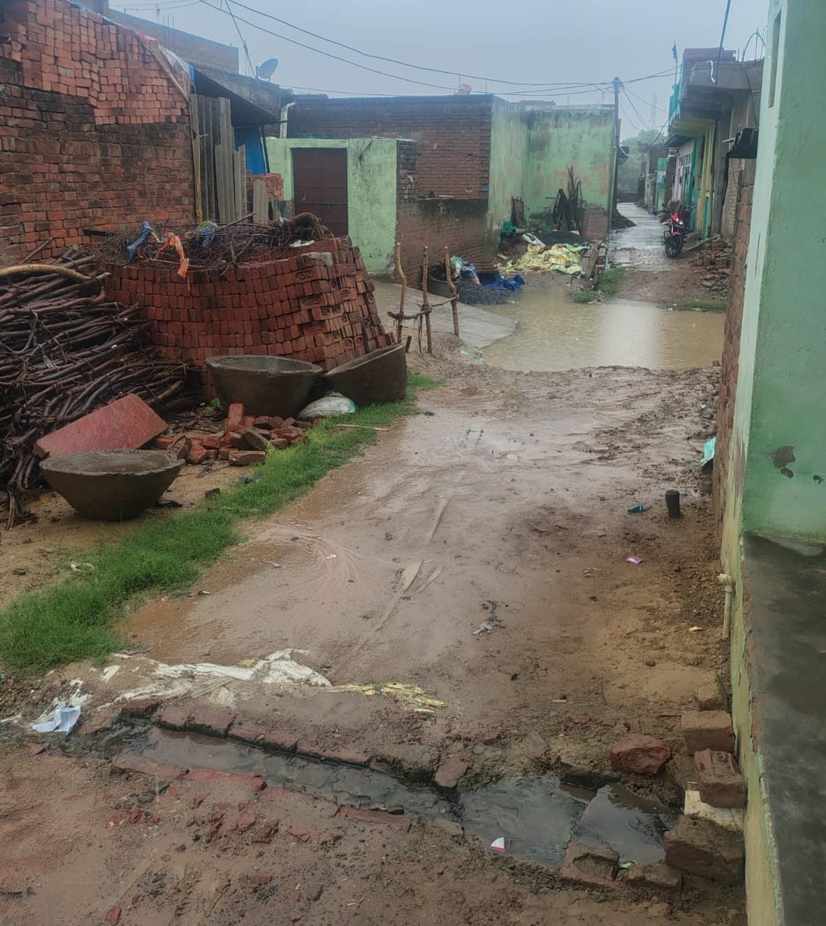 No paved lanes or drains in Maya Nagar; waterlogging causes problems.