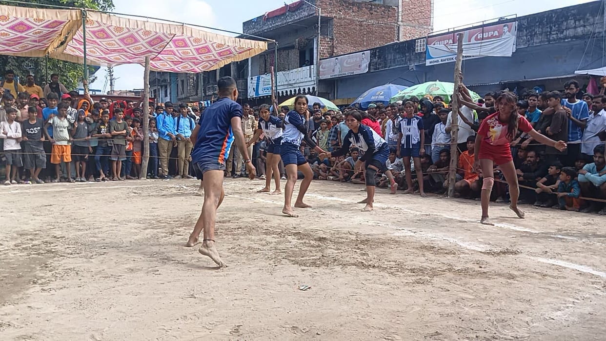 Women players compete fiercely in Kabaddi, spectators thrilled