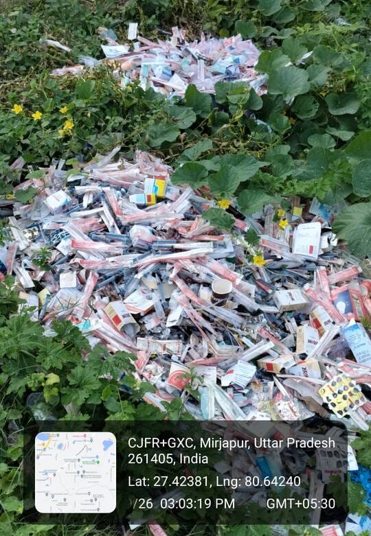 Medical waste dumped in canal; risk of infection.