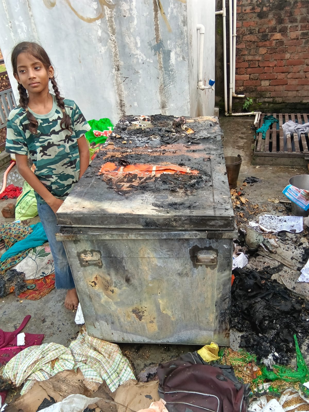 Fire breaks out in BSF personnel's house due to a spark from the stove; belongings gutted.