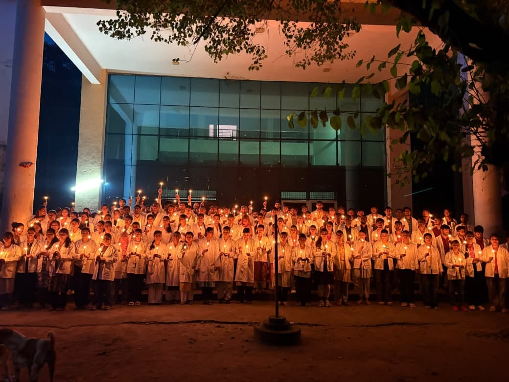 Ayurvedic students hold candlelight march in protest against lathi-charge.