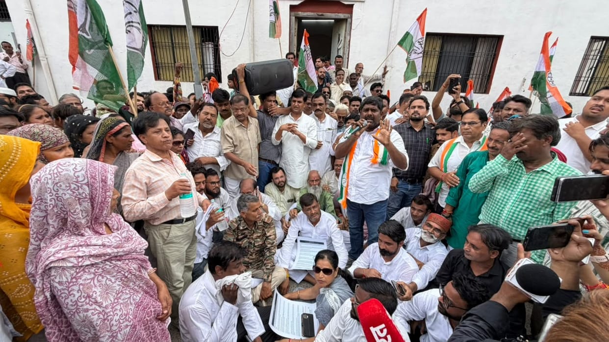 Congress members outraged over public grievances; lay siege to Collectorate.
