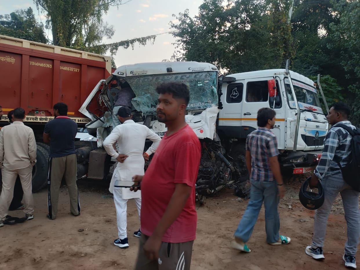 Truck crashes into tractor then rams into another trailer; driver critically injured.