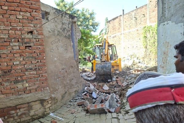 Bulldozer razes 12-year-old encroachment; relief from waterlogging.