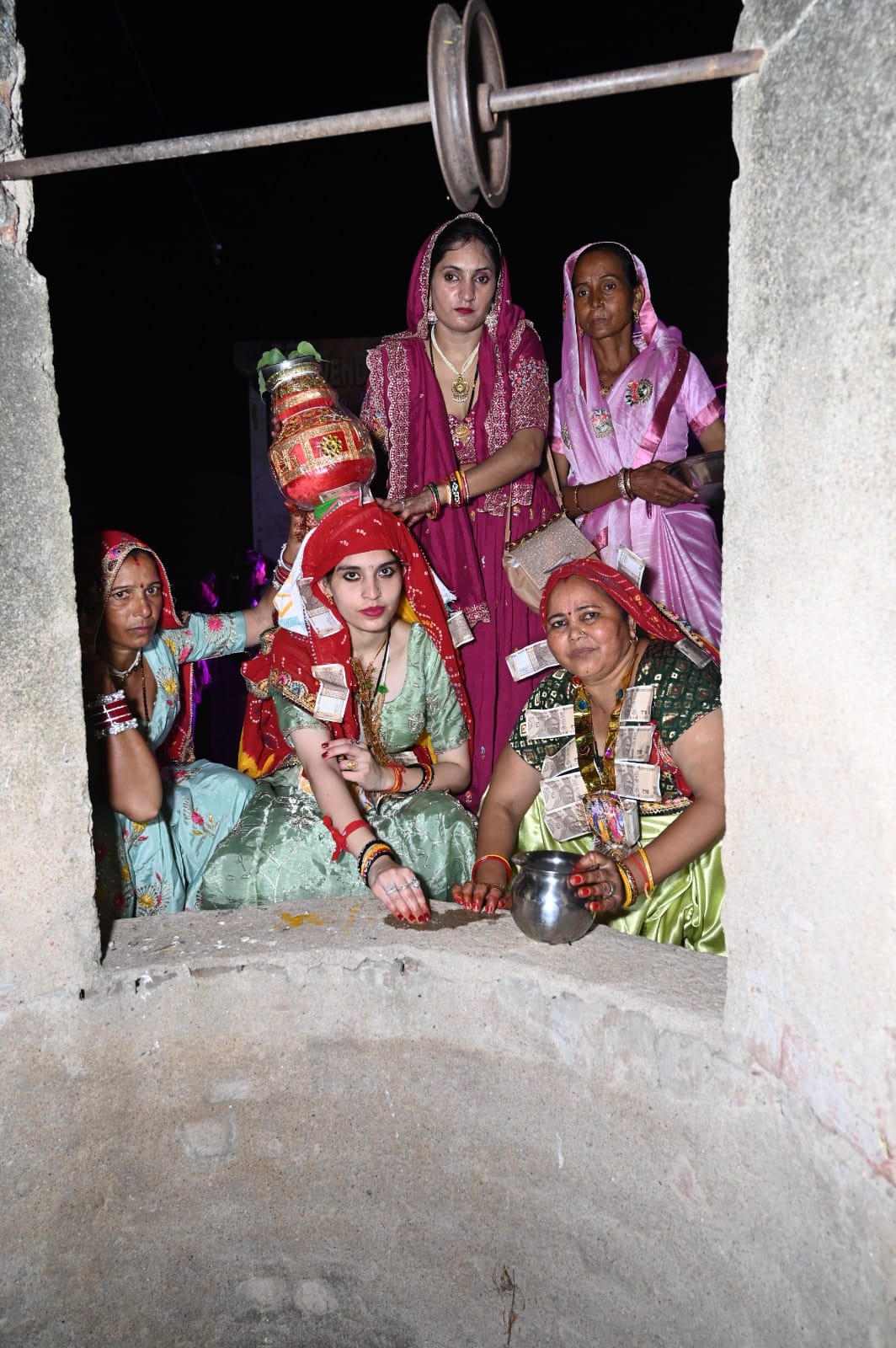 Performed the 'Kuan Pujan' (well-worship ritual) upon the birth