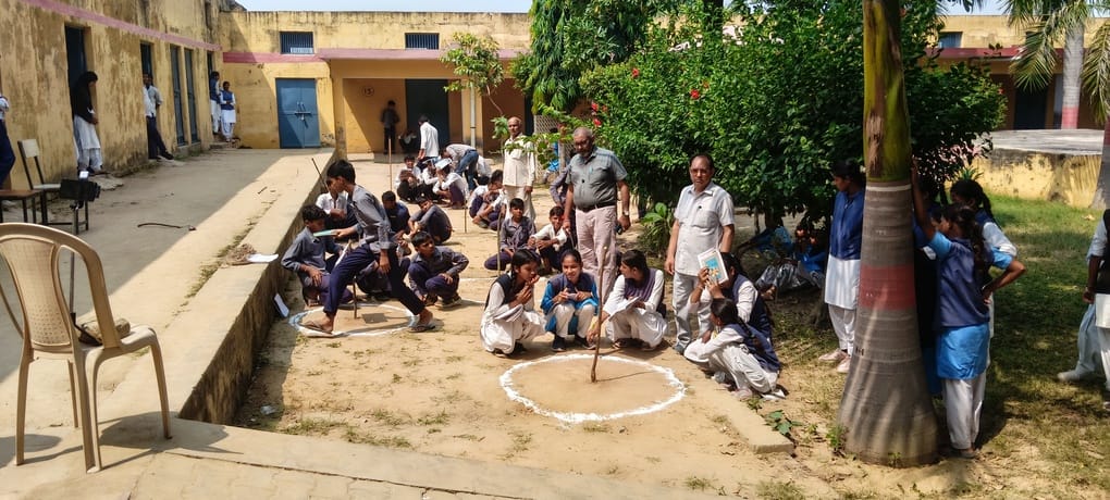 Students measured the Earth's circumference using Eratosthenes' experiment.