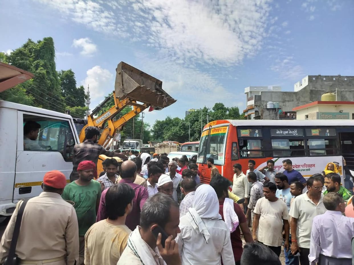 Garbage collection vehicles blockade bus terminal; bus operations come to a halt.