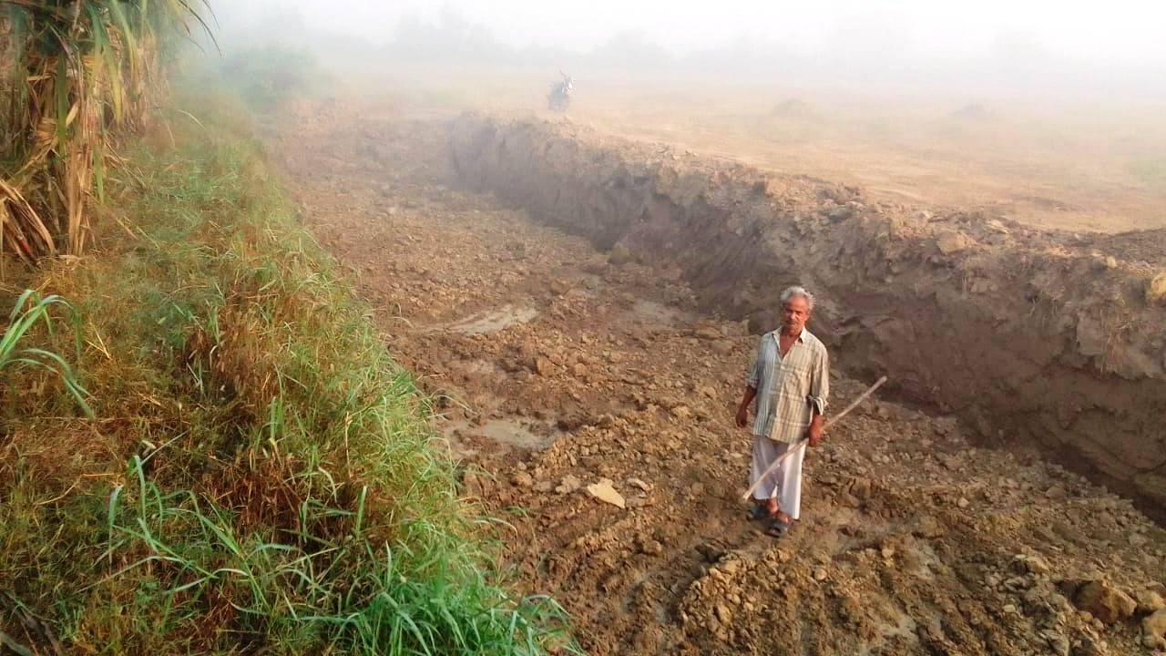 Allegation of illegal soil excavation; damage to crops.