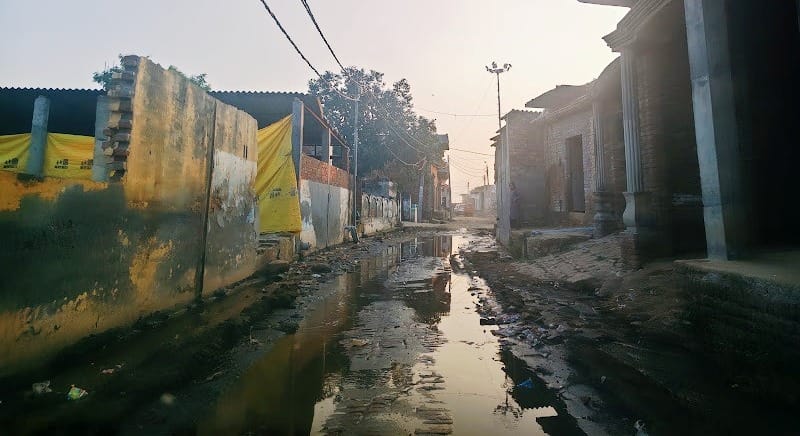 Waterlogging problem for ten years; passing through the main road is difficult.