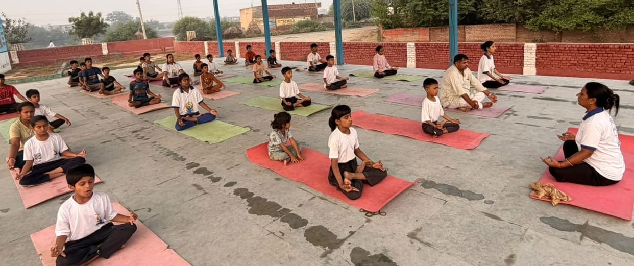 Children practiced yoga and meditation