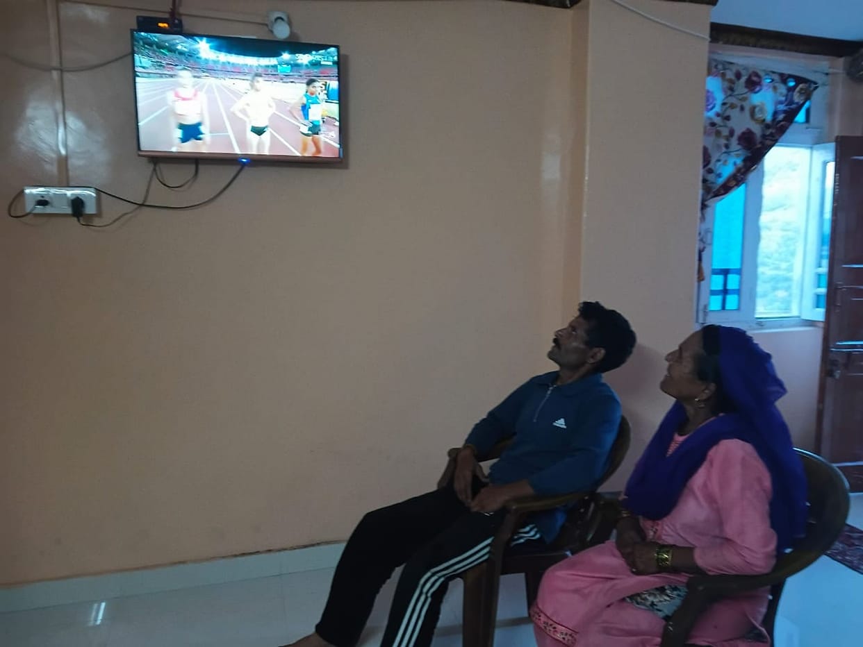 Every breath in the house seemed to freeze as the daughter raced on the screen; tears welled up the moment she won the bronze.