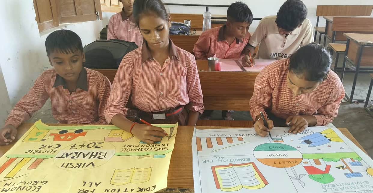 Children showed their talent in painting and rangoli.