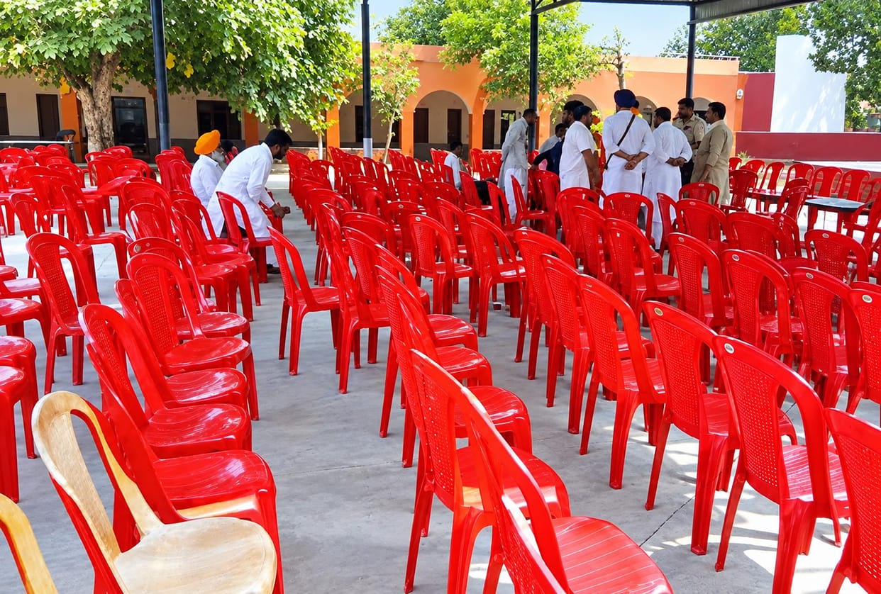 The voice of the gram sabha was lost in empty chairs; out of a village with 9,000 voters, only 12 people showed up, and the meeting was postponed for the 11th time due to lack of quorum.