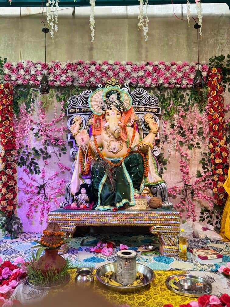 A message of environmental conservation alongside faith through clay Ganpati idols.
