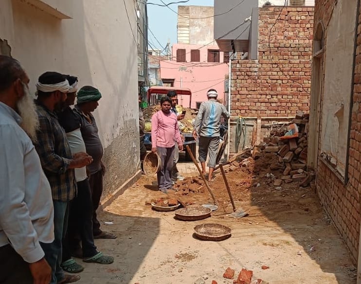 Illegal toilet and wall removed from the lane following a court order