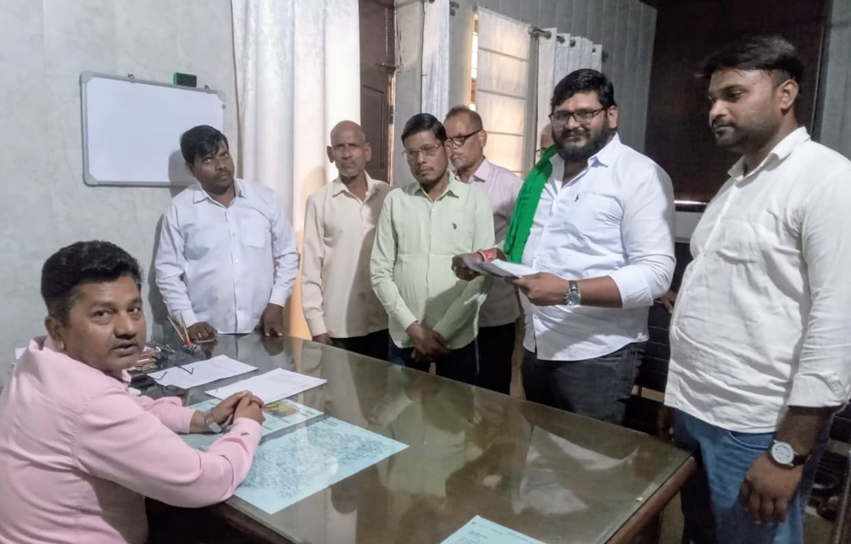 Complaint filed with SDM alleging obstruction in the construction of a *chaupal* (community gathering place).