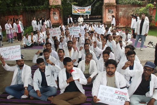 Ayurveda College OPD locked. patients stopped at the gate.