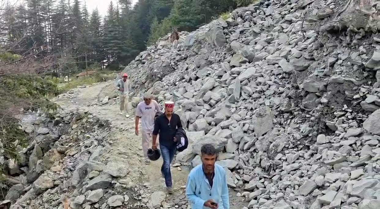 Road not restored even after six days; 2,000 cartons of apples stranded, milk supply halted.