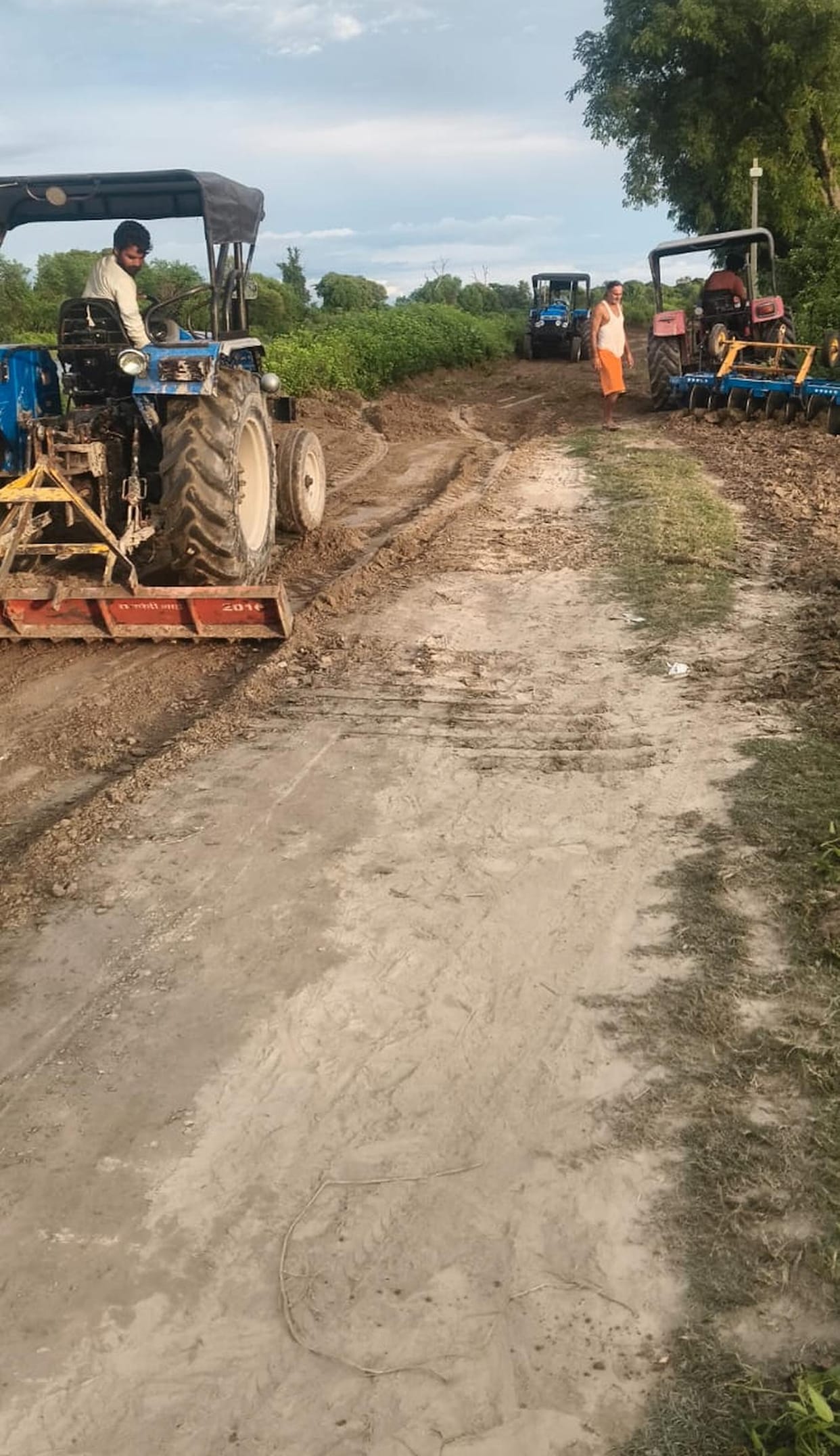 Not waiting for government aid, villagers built the road themselves.