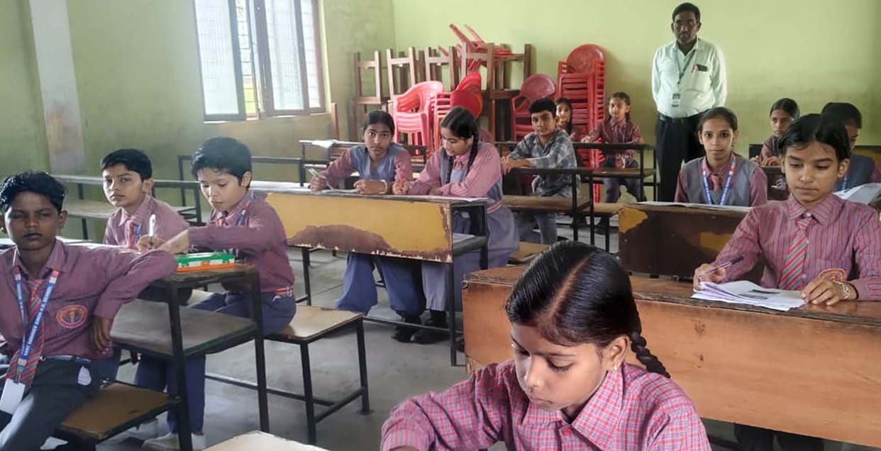 Children took the science exam at the National Olympiad.