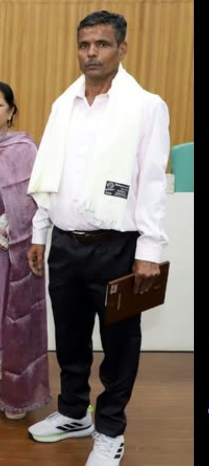 Retired GJU lab assistant burned to death in bus; wife also suffered burns.