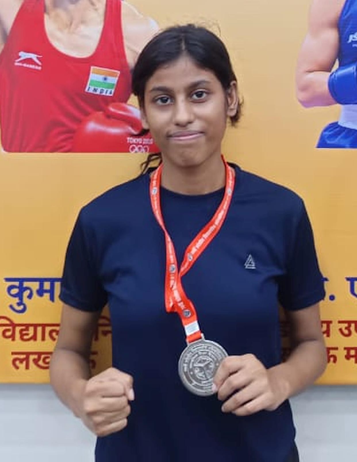 Divya won a silver medal at the state-level boxing competition.