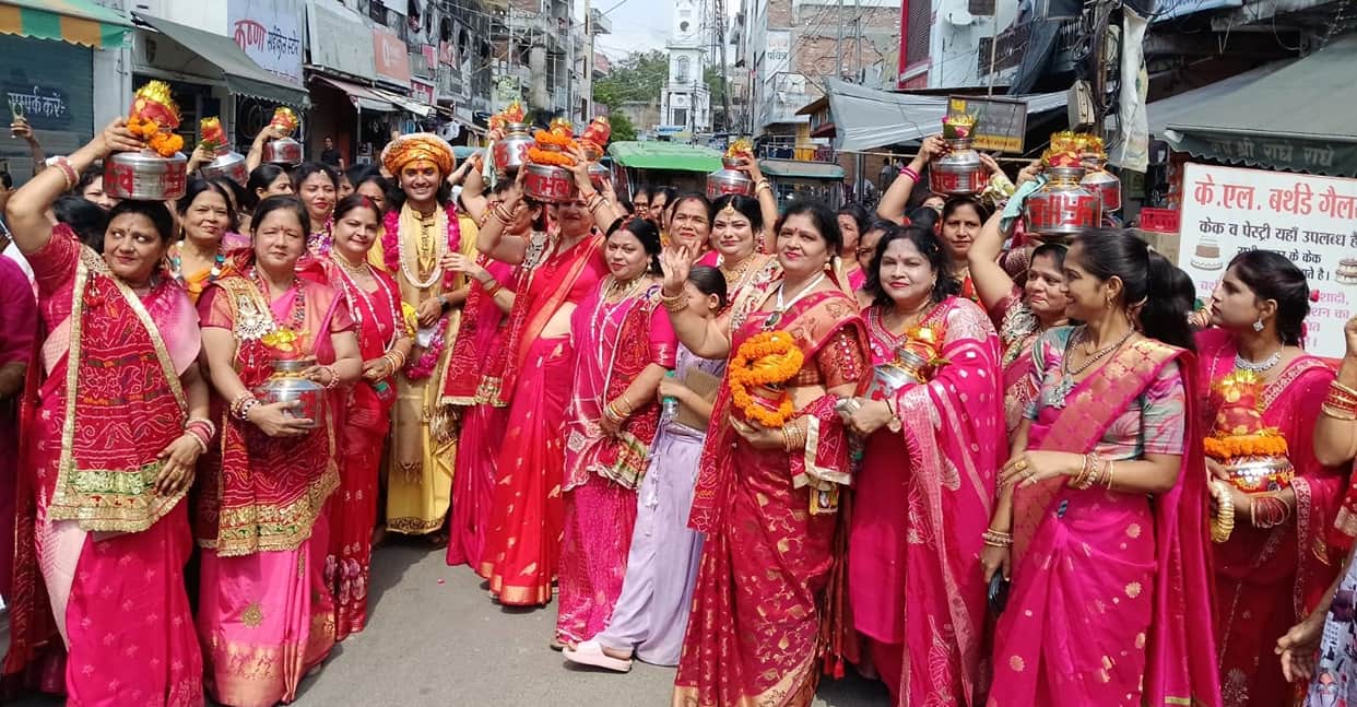 Before the religious discourse, women took out a Kalash Yatra.