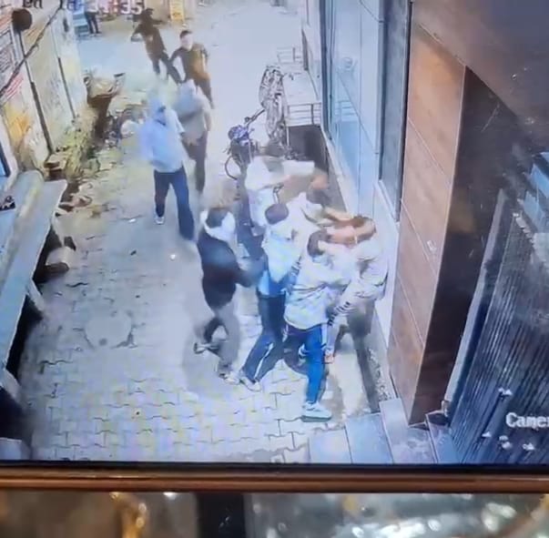 Two friends attacked in dispute over child injured by a bike