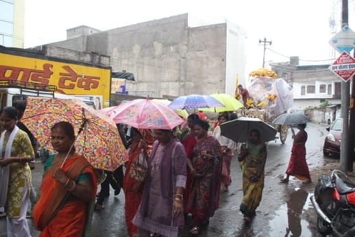 Bappa bid farewell amidst a gentle drizzle. devotees' eyes welled up with tears.
