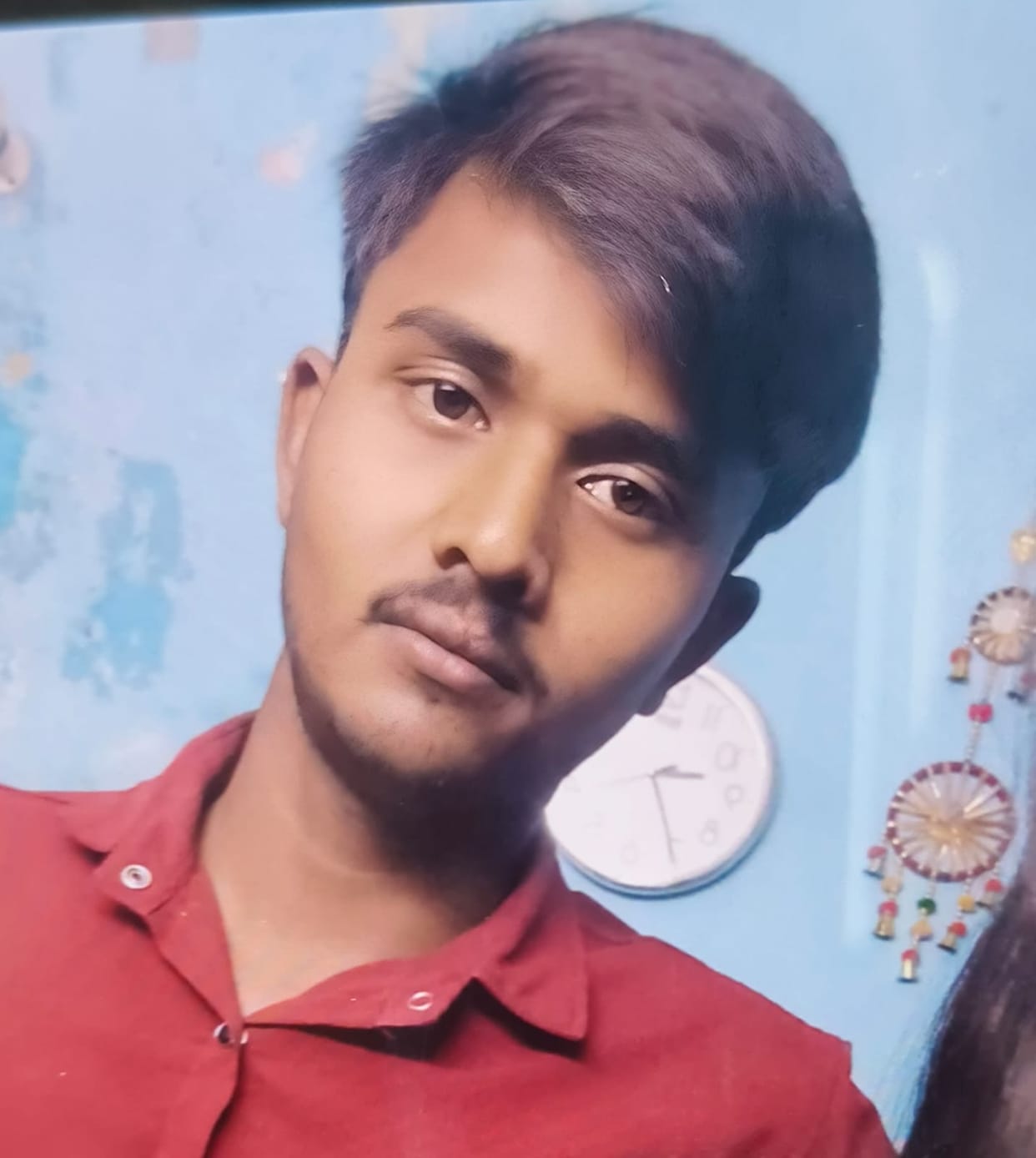 Oncoming car unseen in heavy rain; bike collision kills young man, his mother, and his brother-in-law.