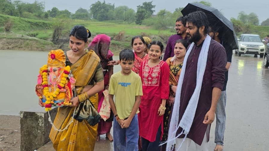 "Ganpati Bappa Morya" echoed amidst the rain