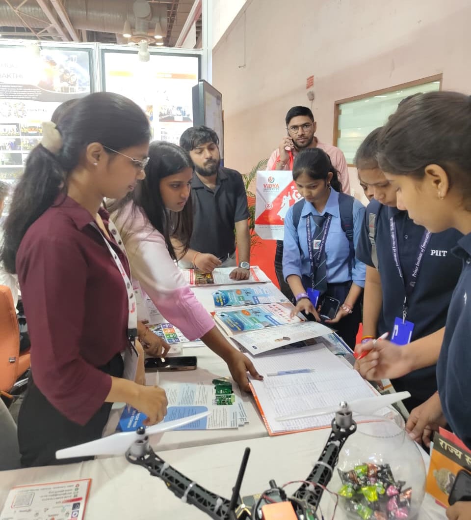 Students exploring future prospects at the GBU stall.