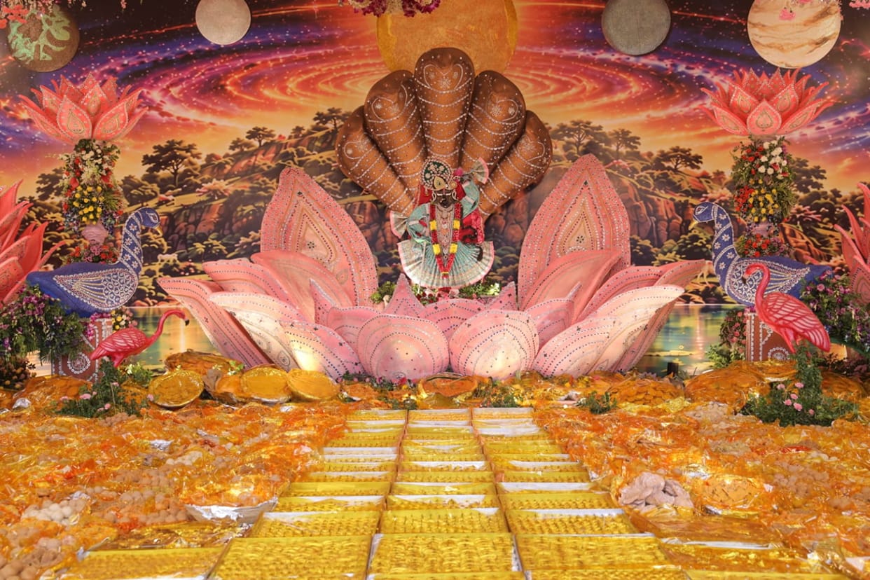 Giriraj seated upon a lotus of seven gems