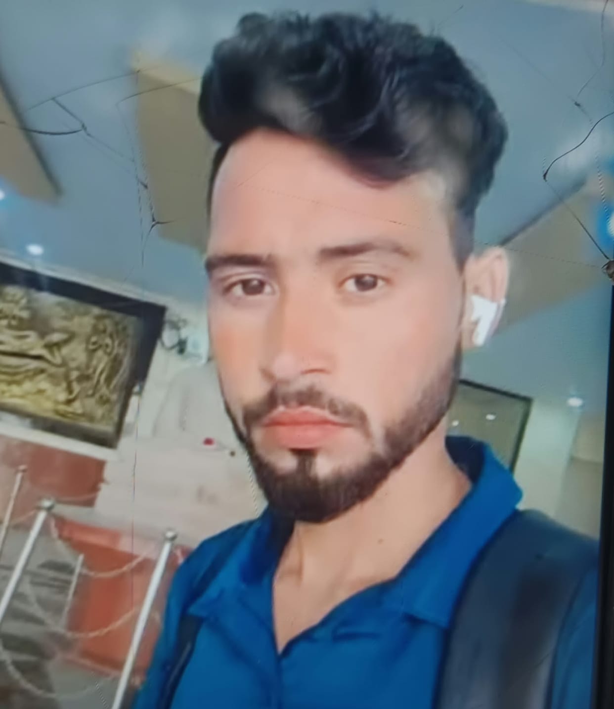 Body of young man visiting in-laws' home found hanging from tree; murder alleged.