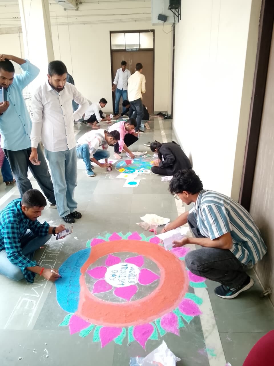 Students' talent was on display in the poster, rangoli, essay, and photography competitions.