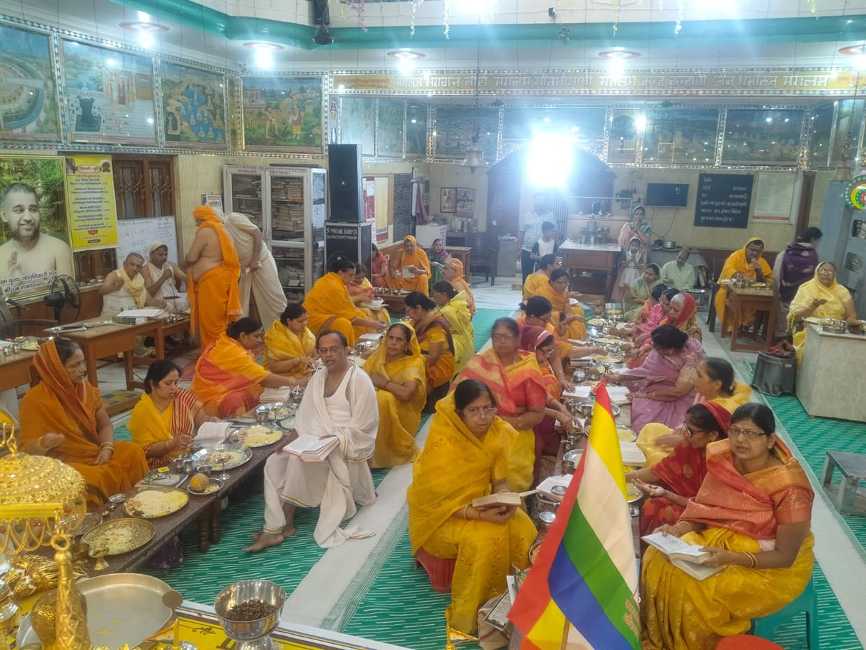 Praying for happiness and peace during the Shantinath Vidhan.
