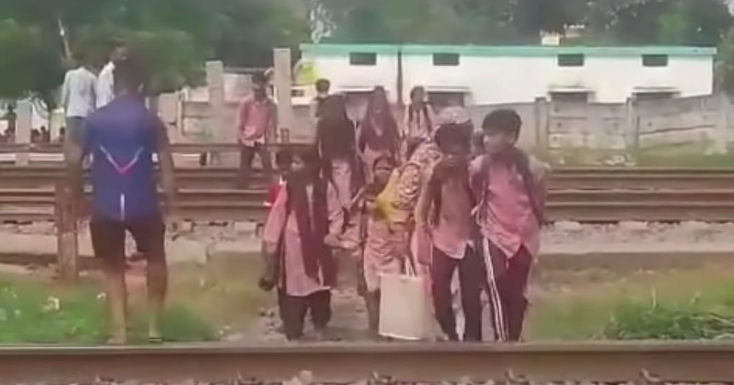 149 innocent children forced to cross railway tracks; teachers upset over supervision duty.