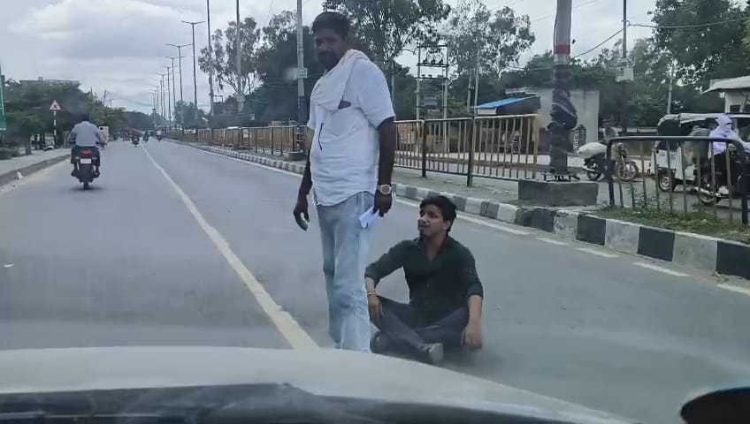 Protest staged by sitting on the highway over disability pension.