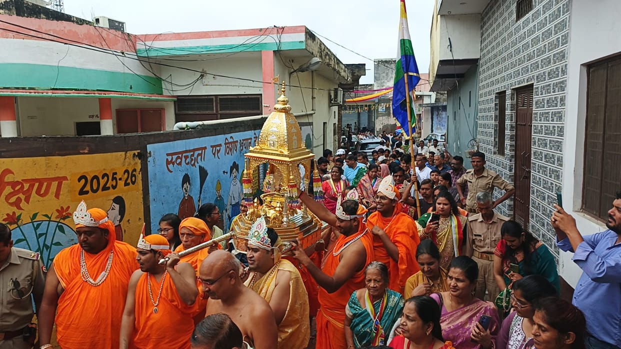 Palanquin procession of Lord Shriji taken out with a musical band.