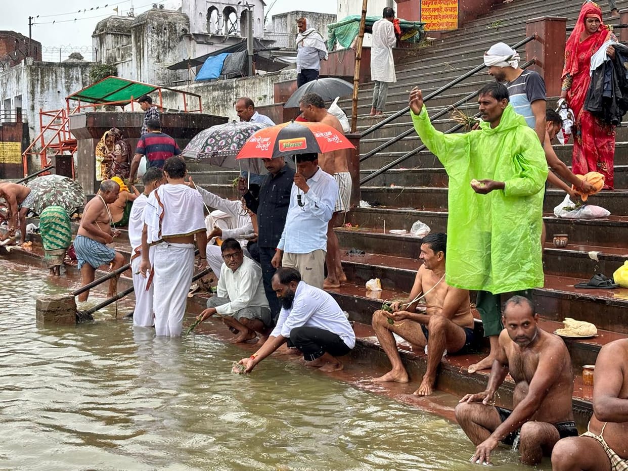 Performed *Tarpan* to seek liberation from ancestral debt by taking a holy dip in the Yamuna.