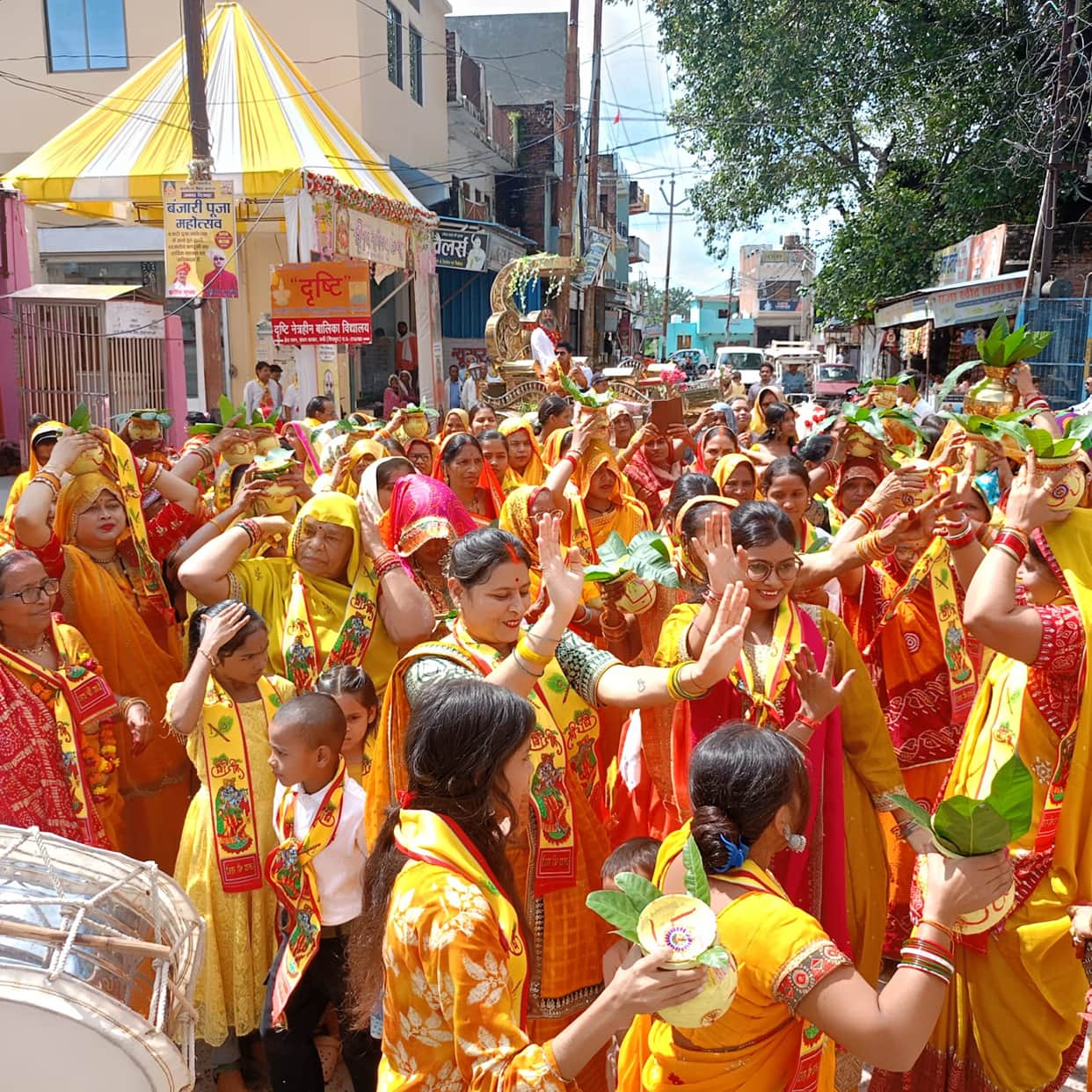 Bhagwat Katha begins with a Kalash Yatra.Bhagwat Katha begins with a Kalash Yatra.