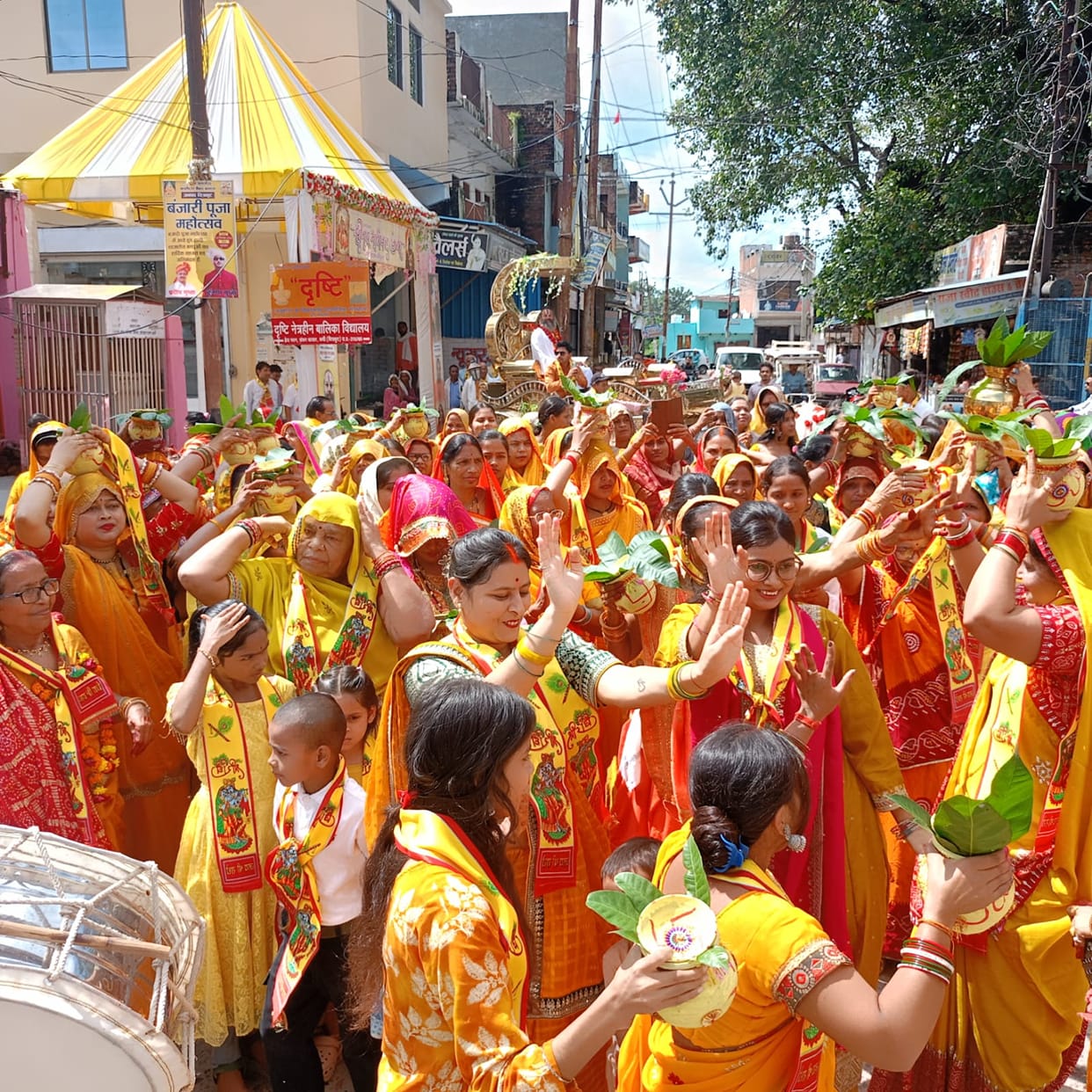 Bhagwat Katha begins with a Kalash Yatra.Bhagwat Katha begins with a Kalash Yatra.