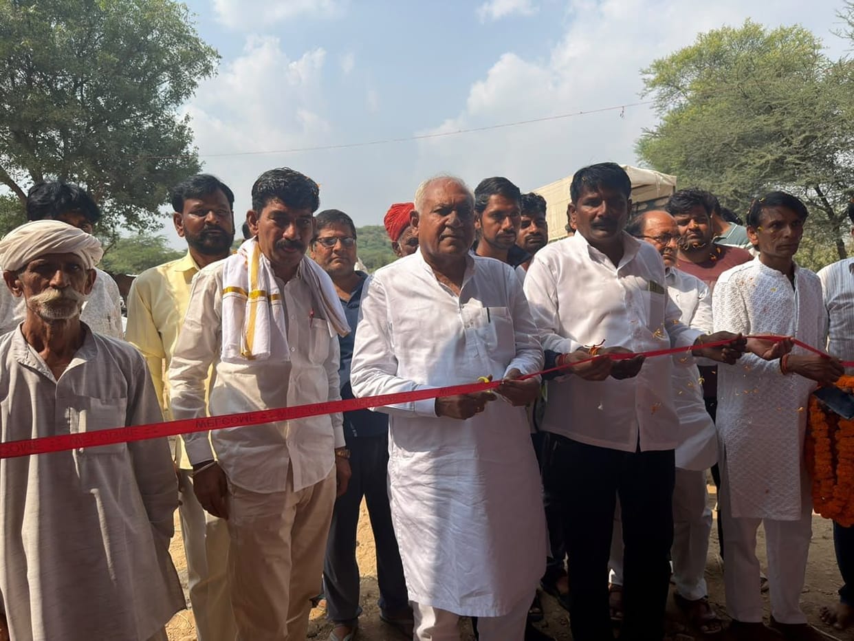 MLA lays the foundation stone for the cowshed.