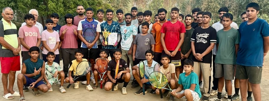 Ajay Malik wins national tennis tournament title.
