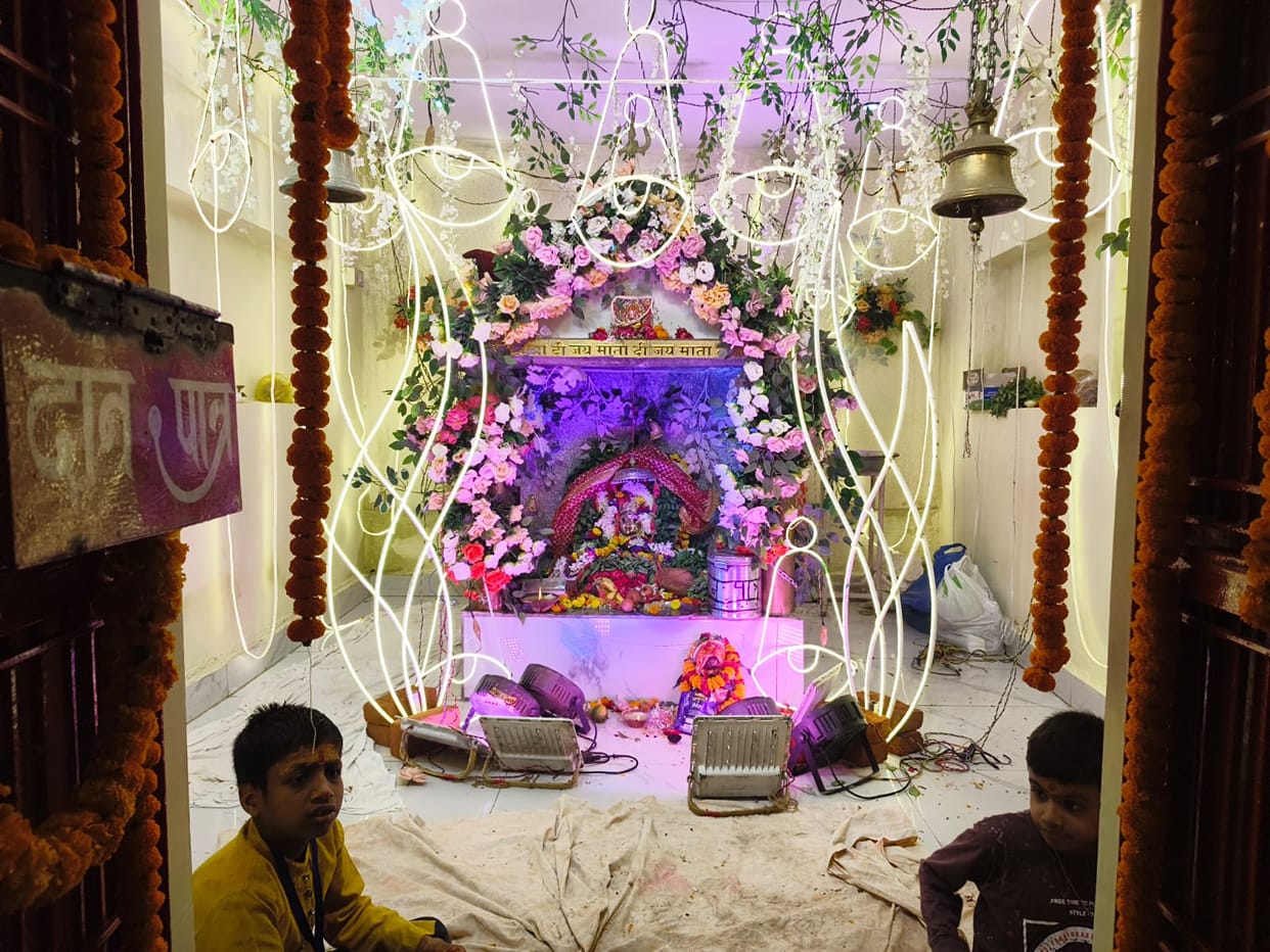 Devotees throng to witness the adornment of Goddess Sheetla Mata.